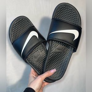 Black Nike slides